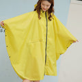 Hooded rain cape with sleeves and zip