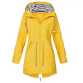 Women's hooded rain jacket with drawstring waist